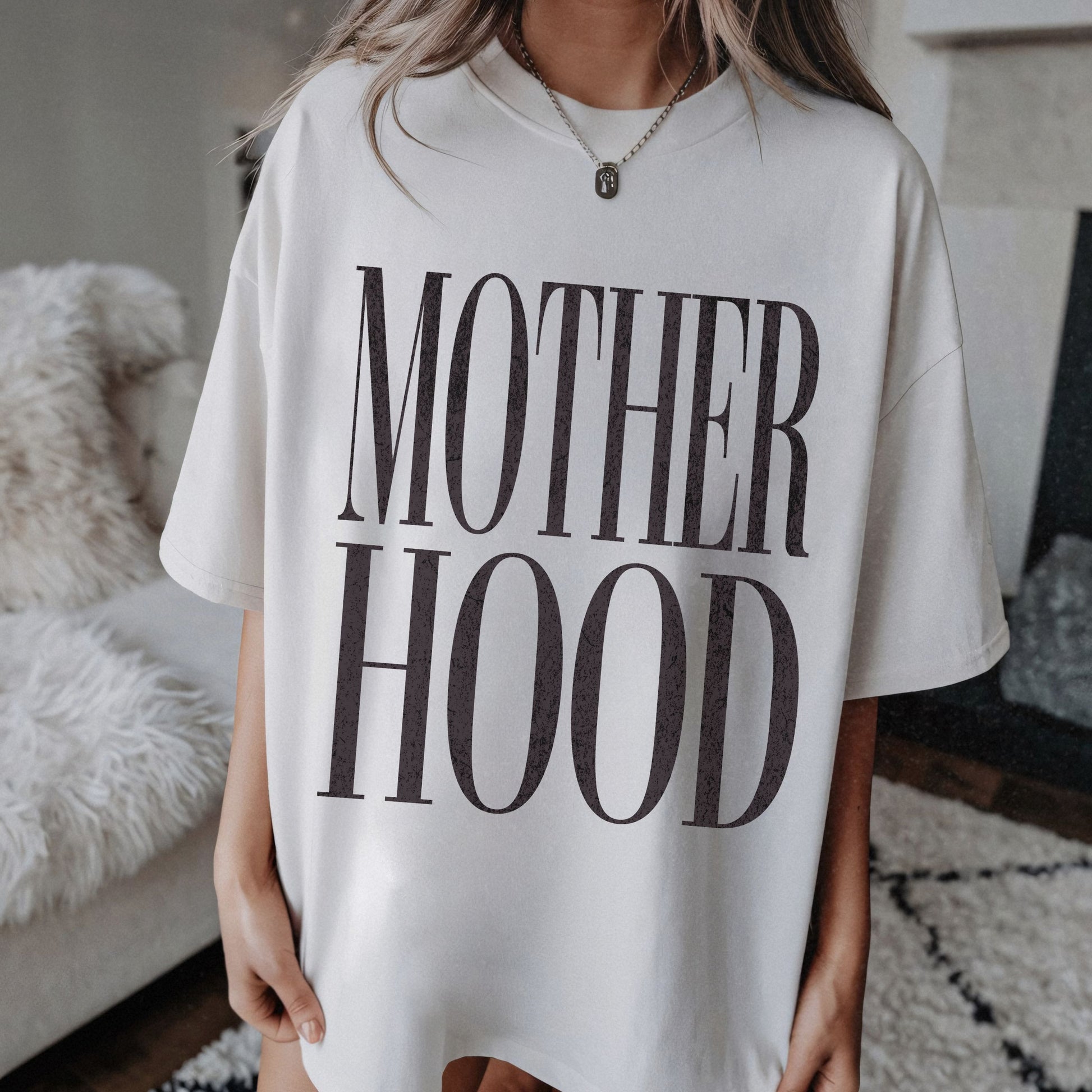 Minimalist Mom Tee with bold graphic design and relaxed fit. Modern Mom T-Shirt perfect for everyday wear. Chic Oversized Tee for stylish moms. Statement Mom Tee with comfy feel, great for mom life outfits, casual looks, and motherhood style.