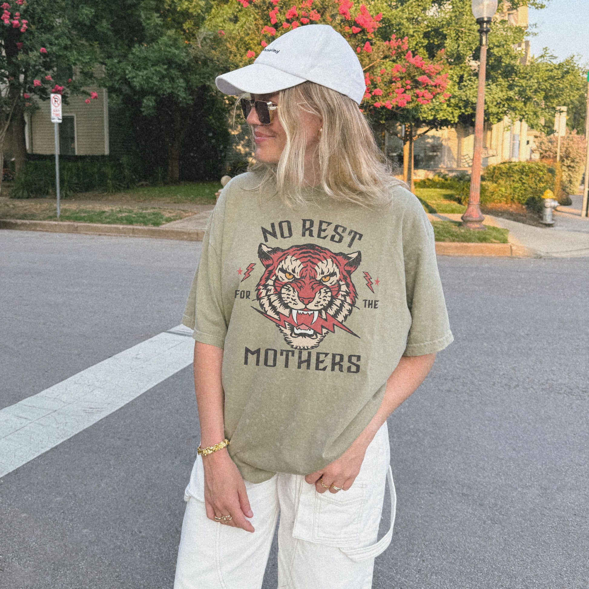 Bold tiger graphic on a No Rest for Mothers Tee, designed for empowered moms. This Tiger Mom Graphic Tee and Vintage Mom Graphic Tee combines retro flair with edgy style. Perfect for casual wear, gifting, or embracing mom life with confidence.